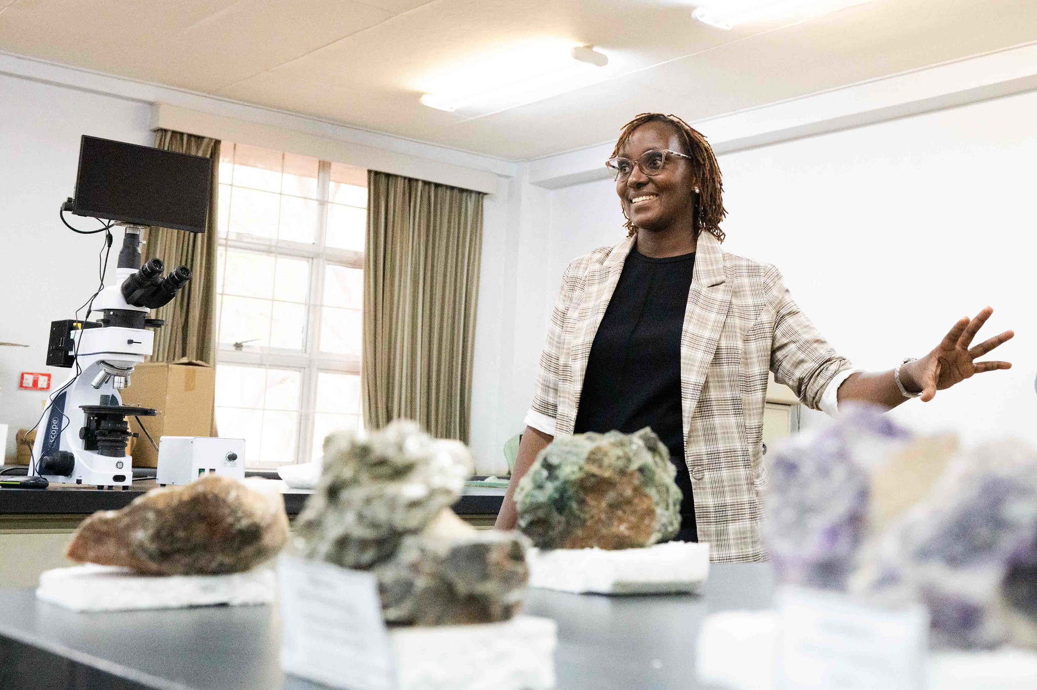 Lecturer Juliah Muriuki in the mineralogy and petrology laboratory at JKUAT, established with support from SG‑NAPI.
