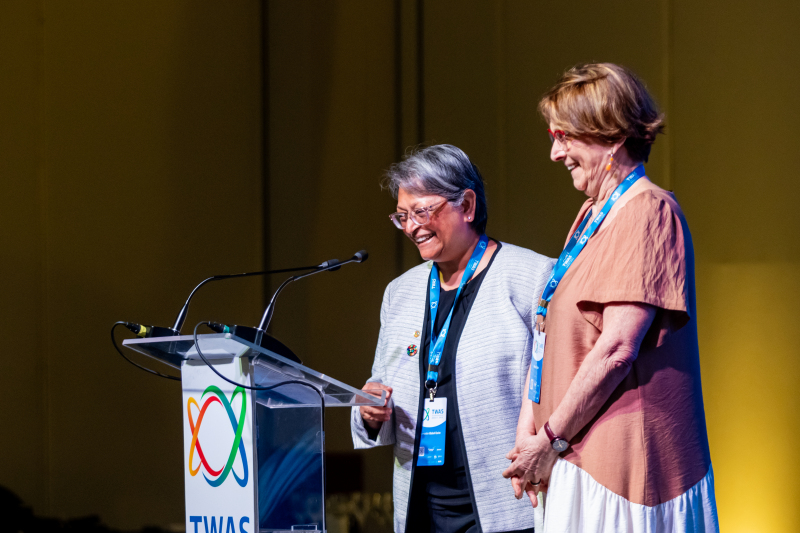 TWAS President Quarraisha Abdool Karim, left, and TWAS Fellow Helena B. Nader, president of the Brazilian Academy of Sciences, during the closing ceremonies of the 17th TWAS General Conference in Rio de Janeiro, Brazil. (Photo: Mario Marques)