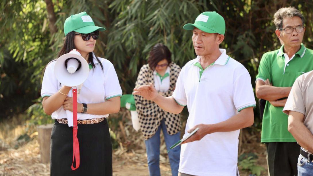 Sengphachanh Sonethavixay, left, taking part in field work. (Photo provided)